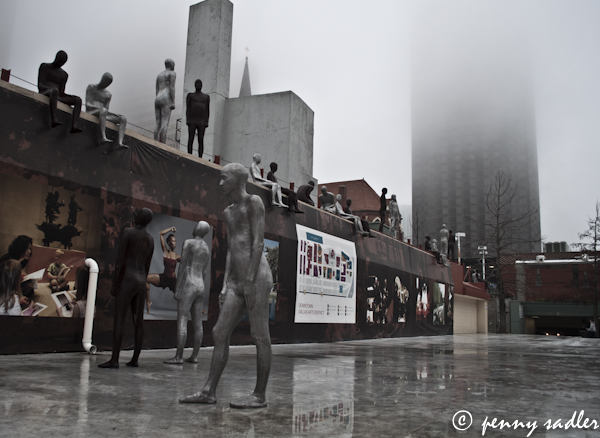 Borders Sculpture and fog at modern buildings Dallas Arts District