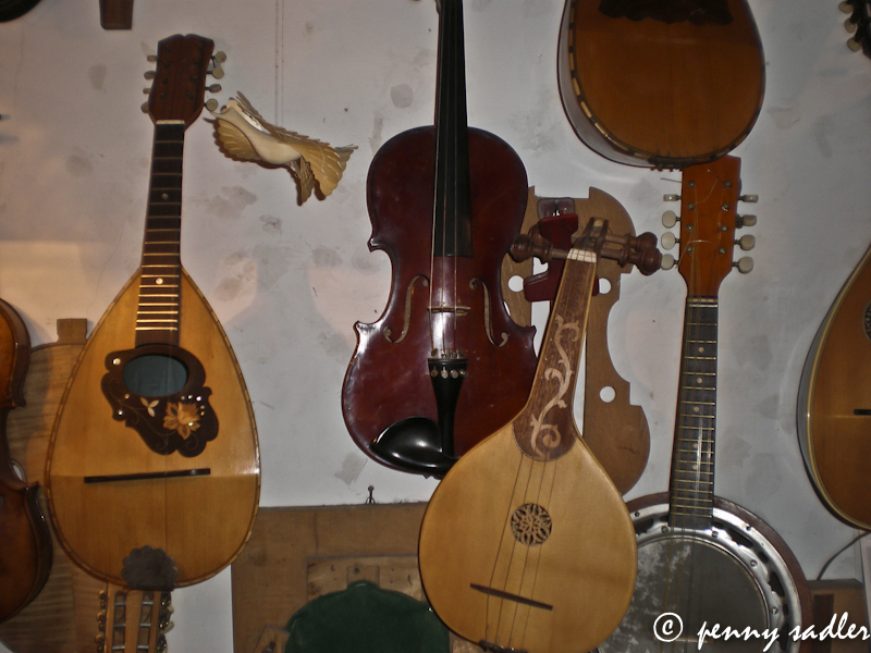 musical instruments in a workshop in Trastevere