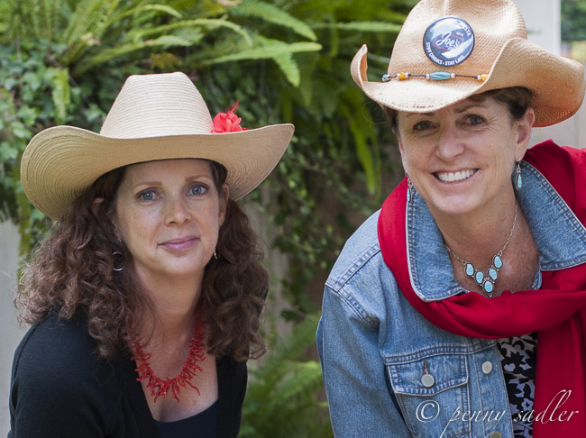 Two ladies in cowboy hats and western wear. Fiesta Santa Barbara