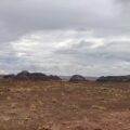 colorful layers of sedimentary rock form the Tepees in the Arizona Painted Desert.