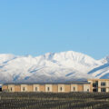 Domaine Bousquet winery with snow capped mountains in background