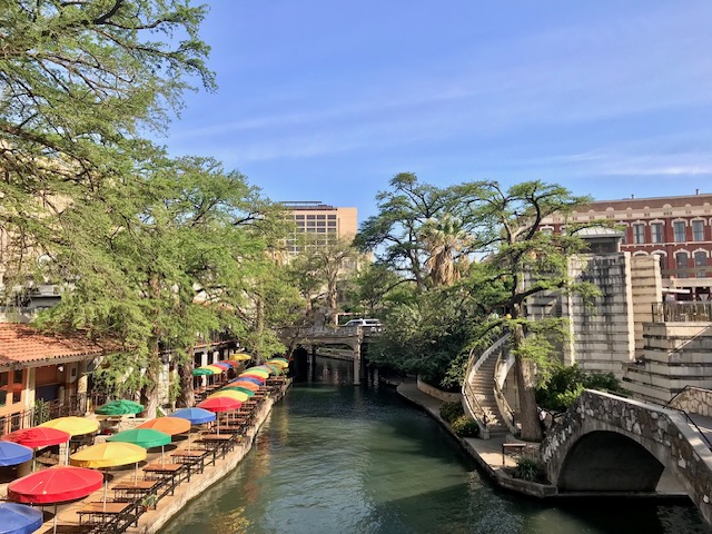 San Antonio riverwalk with umbreallas