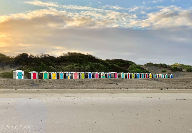 colorful Cabanas on the beach in Braunton, North devon