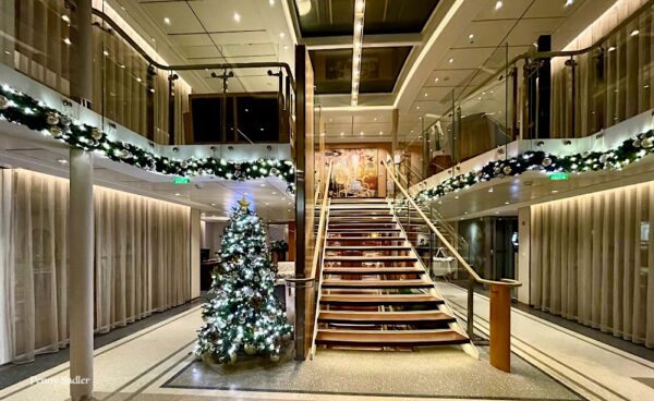 Christmas tree and lights illuminate the stairway on the Viking longship Viljelm