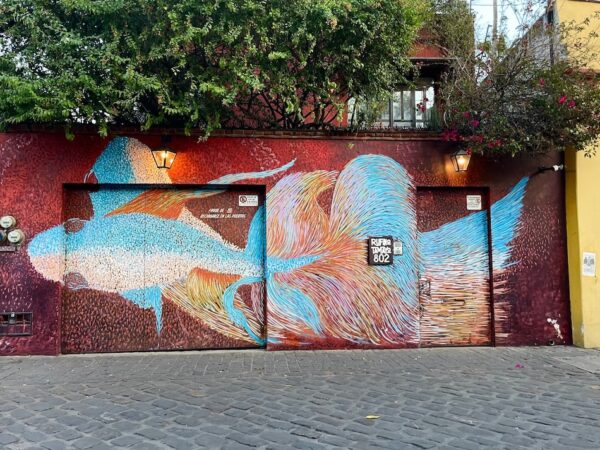 colorful fish mural in the Xochimilco neighborhood of Oaxaca, Mexico