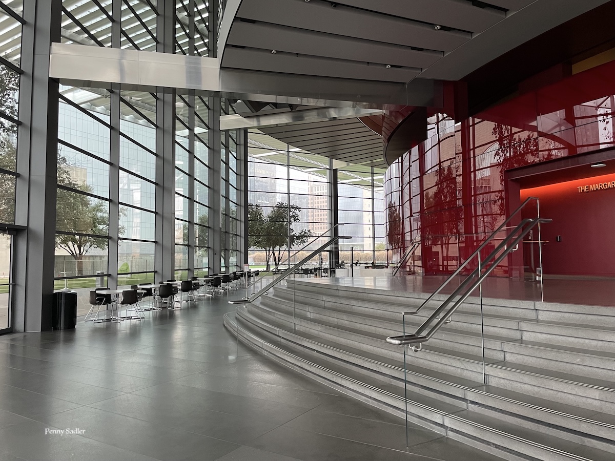 beautiful red entrance to the Winspear Opera House in Dallas.